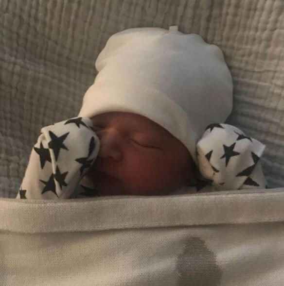 Frank Bale's grandchild, Alex Charles.